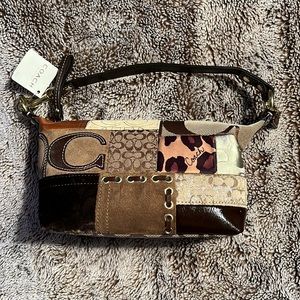 ***BRAND NEW**** Coach handbag never worn. No dust bag.